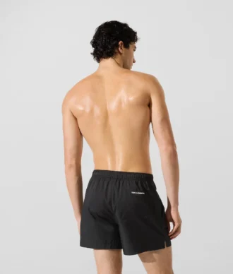 Boardshorts mit Monogramm-Ansteckpin
