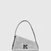Glänzende Schultertasche mit Geo-Muster