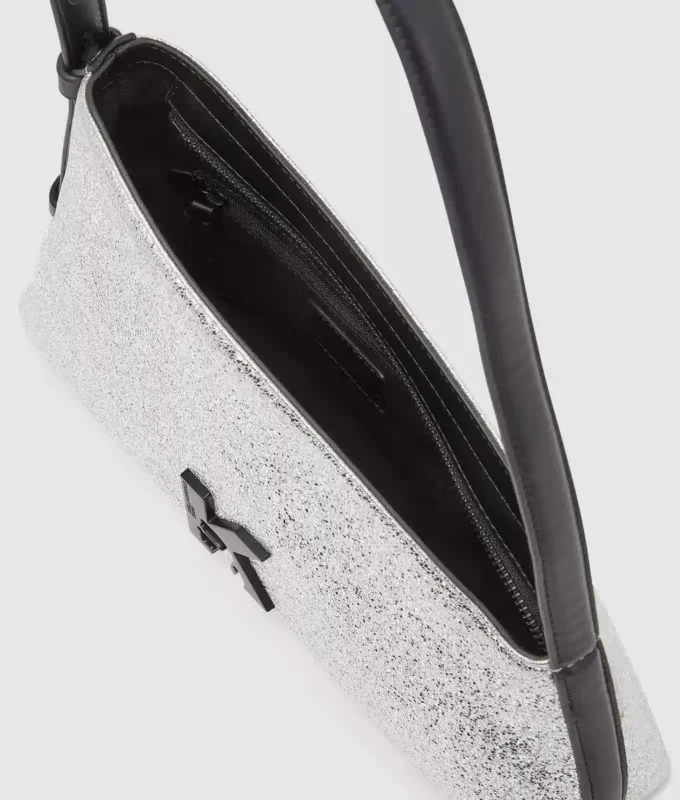 Glänzende Schultertasche mit Geo-Muster