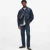 Jeans mit durchgehendem Monogramm Jeans mit durchgehendem Monogramm