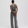 JERSEY-JUMPSUIT MIT STRASSSTEINEN