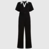 Jumpsuit mit charakteristischem Kragen Jumpsuit mit charakteristischem Kragen