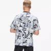 Lässiges T-Shirt mit durchgehendem Monogramm-Print