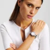 MIT KRISTALLEN VERZIERTE UHR MIT KRISTALLEN VERZIERTE UHR