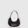 Schultertasche aus Lammfell mit Mondmotiv
