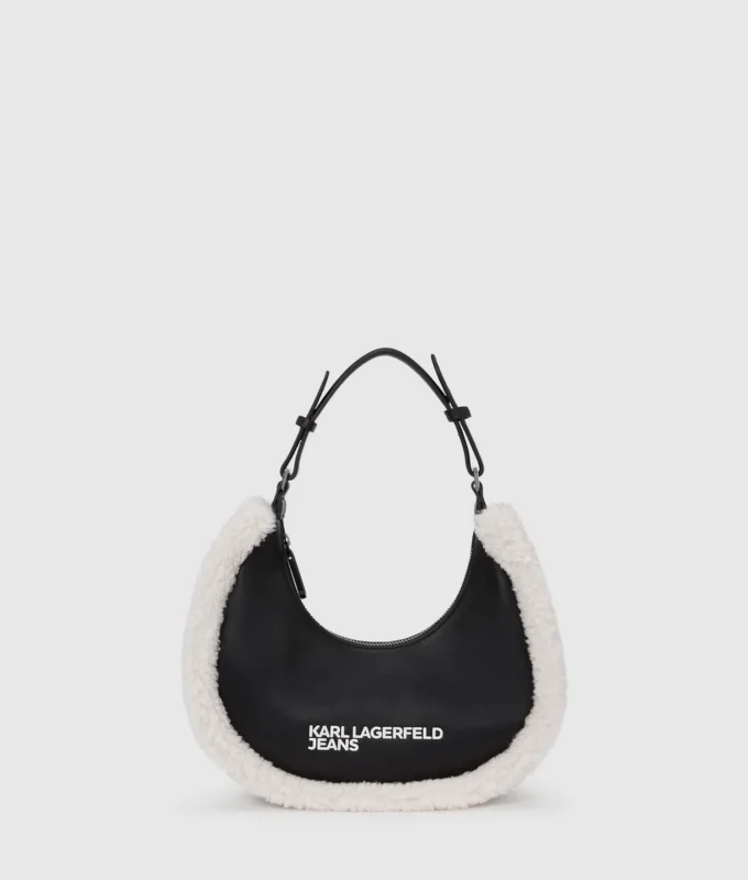 Schultertasche aus Lammfell mit Mondmotiv