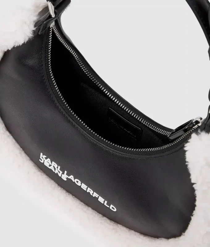 Schultertasche aus Lammfell mit Mondmotiv