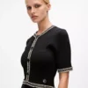Strickkleid mit Bouclé-Details Strickkleid mit Bouclé-Details