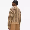 Strickpullover mit Rollkragen und Zopfmuster Strickpullover mit Rollkragen und Zopfmuster