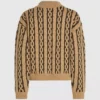 Strickpullover mit Rollkragen und Zopfmuster Strickpullover mit Rollkragen und Zopfmuster