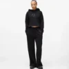 Sweathose mit Monogramm und Nieten Sweathose mit Monogramm und Nieten