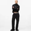 Sweathose mit Monogramm und Nieten Sweathose mit Monogramm und Nieten