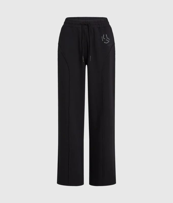 Sweathose mit Monogramm und Nieten Sweathose mit Monogramm und Nieten