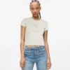 T-Shirt mit Monogramm und Nieten T-Shirt mit Monogramm und Nieten