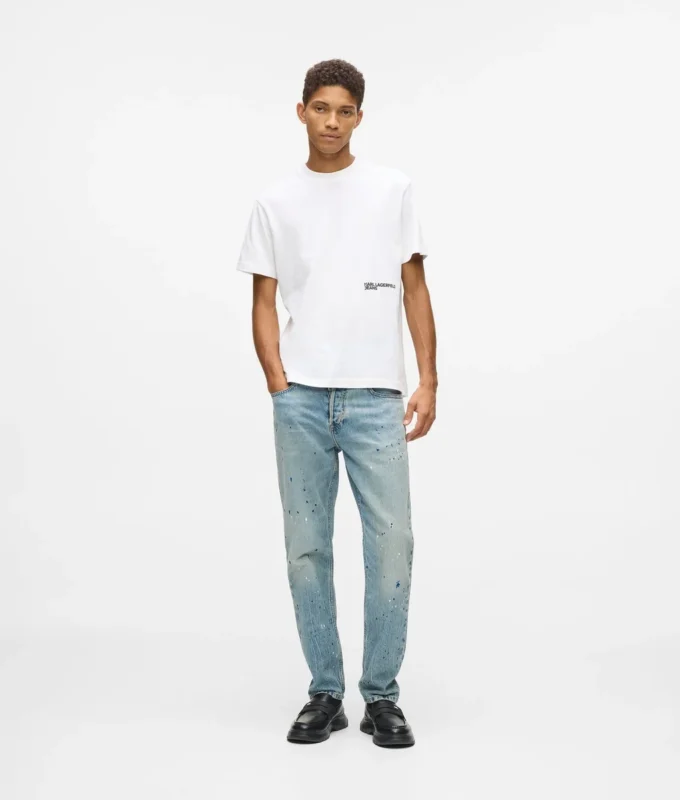 Tapered Jeans mit Farbspritzern Tapered Jeans mit Farbspritzern