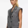 Tweedweste mit Paillettenrevers Tweedweste mit Paillettenrevers