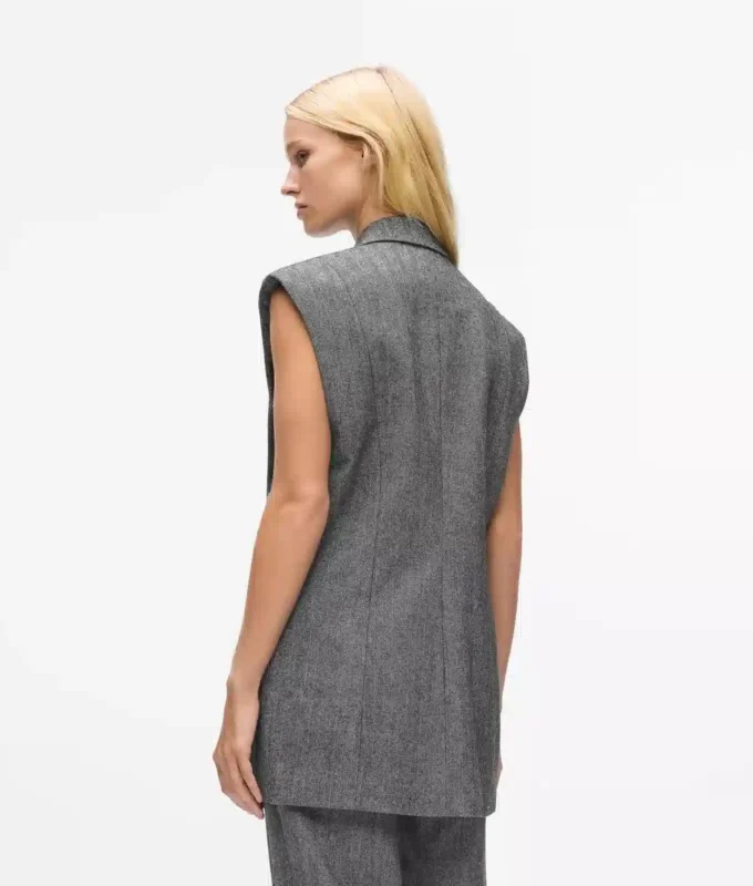 Tweedweste mit Paillettenrevers Tweedweste mit Paillettenrevers